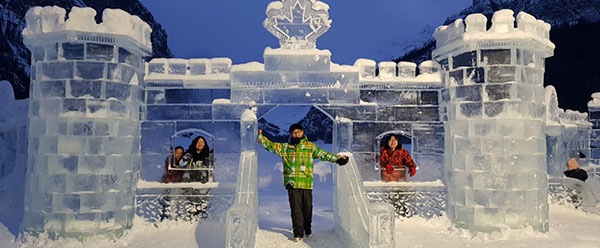 Kids inside the ice castle in Lake Louise